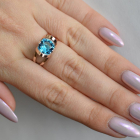 Срібна каблучка з золотими вставками