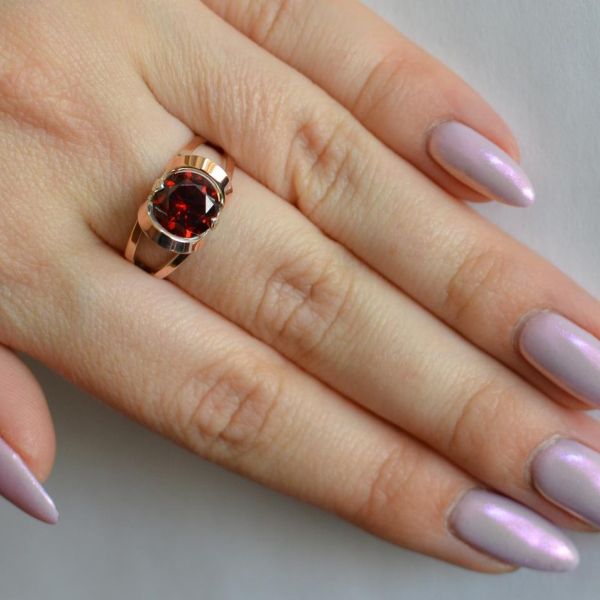 Срібна каблучка з золотими вставками