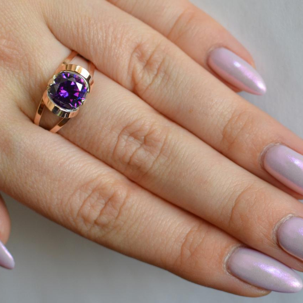 Срібна каблучка з золотими вставками