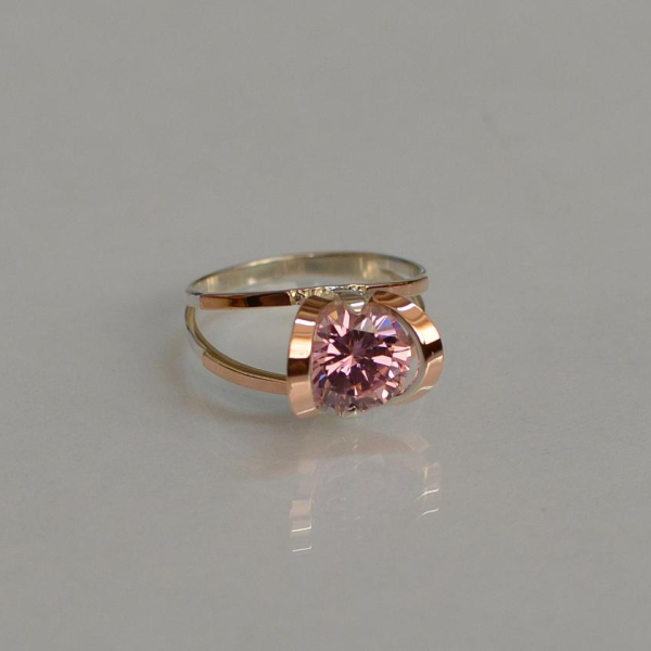 Срібна каблучка з золотими вставками