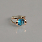 Срібна каблучка з золотими вставками