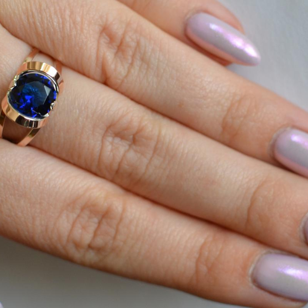 Срібна каблучка з золотими вставками