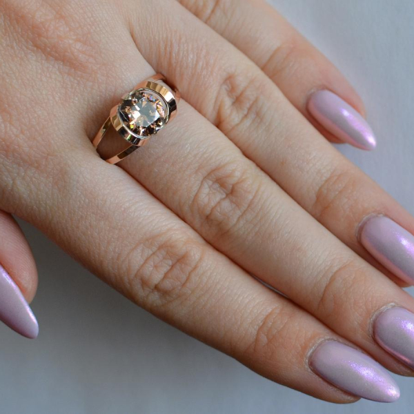 Срібна каблучка з золотими вставками