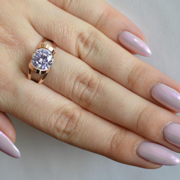 Срібна каблучка з золотими вставками