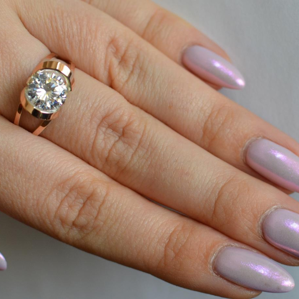 Срібна каблучка з золотими вставками