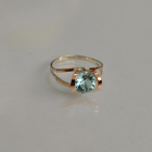 Срібна каблучка з золотими вставками