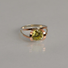 Срібна каблучка з золотими вставками