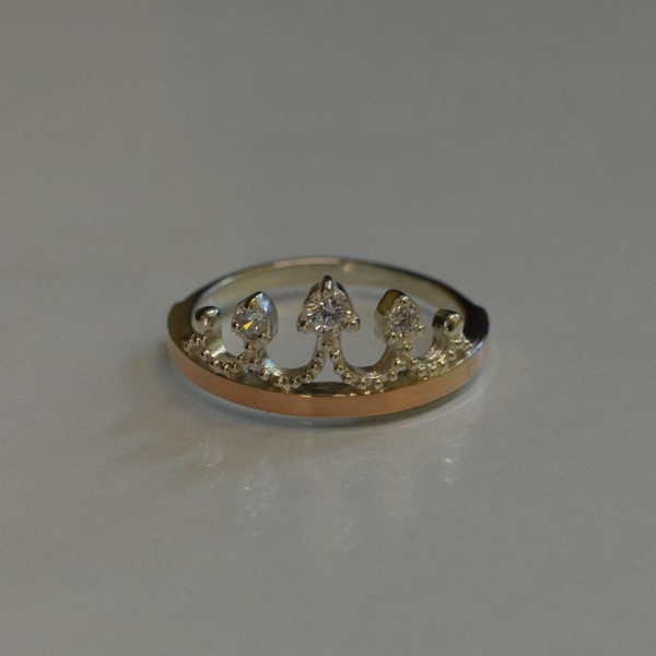 Срібна каблучка з пластинами із золота