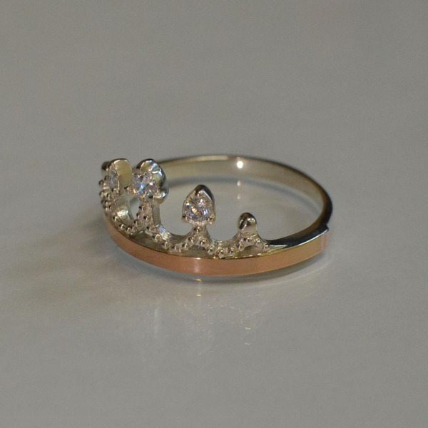 Срібна каблучка з пластинами із золота