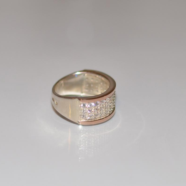 Срібна каблучка з золотими пластинами