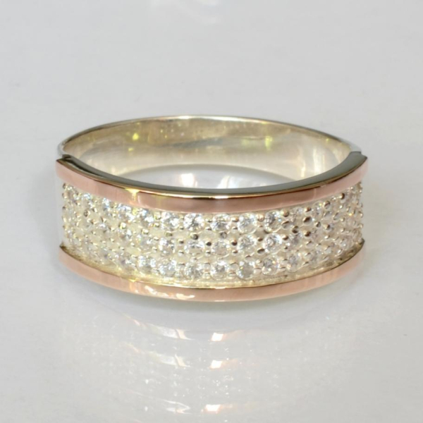 Срібна каблучка з золотими пластинами