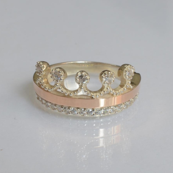 Срібна каблучка з напайками із золота