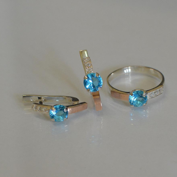 Срібний комплект з золотими пластинами