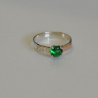 Срібна каблучка з золотими вставками