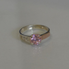 Срібна каблучка з золотими вставками