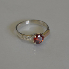 Срібна каблучка з золотими вставками