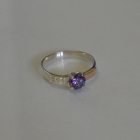 Срібна каблучка з золотими вставками