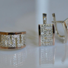 Срібний набір із золотими пластинами