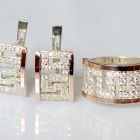 Срібний набір із золотими пластинами