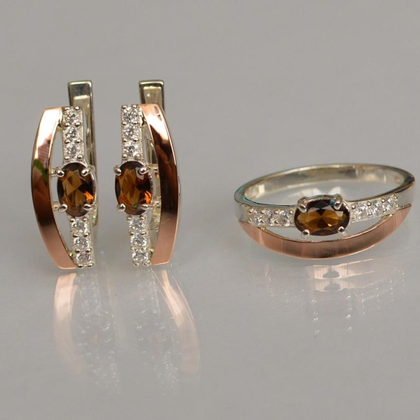 Срібний набір з золотими вставками