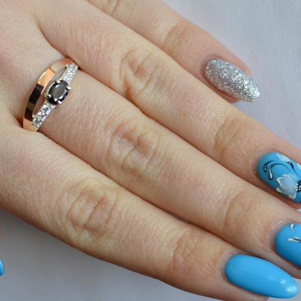 Срібна каблучка з накладками з золота