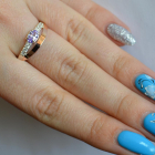 Срібна каблучка з накладками з золота