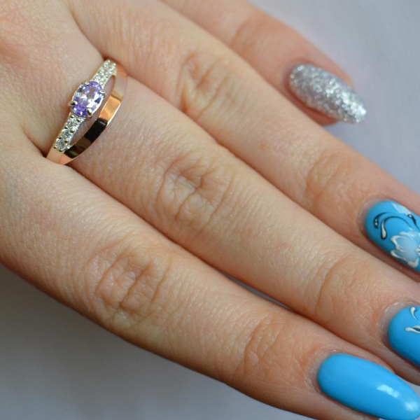 Срібна каблучка з накладками з золота