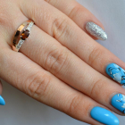 Срібна каблучка з накладками з золота