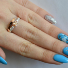 Срібна каблучка з накладками з золота