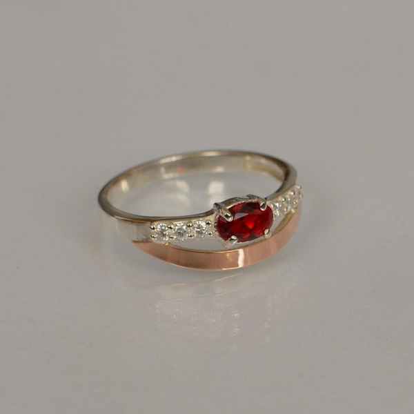 Срібна каблучка з накладками з золота