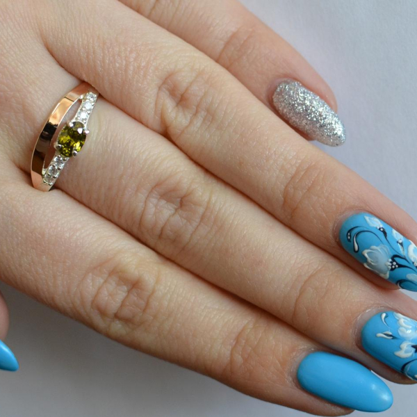 Срібна каблучка з накладками з золота