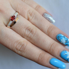 Срібна каблучка з накладками з золота