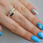 Срібна каблучка з накладками з золота