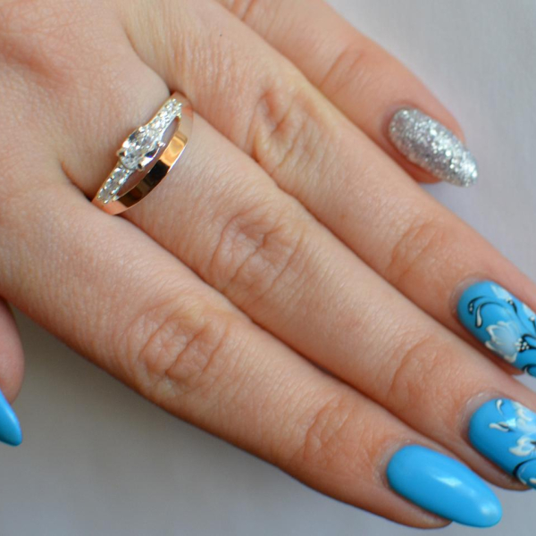 Срібна каблучка з накладками з золота