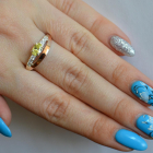 Срібна каблучка з накладками з золота