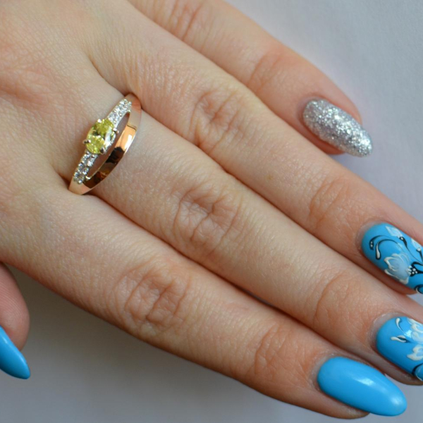 Срібна каблучка з накладками з золота