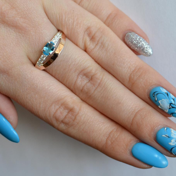 Срібна каблучка з накладками з золота