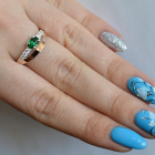 Срібна каблучка з накладками з золота