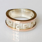 Срібна каблучка з напайками із золота
