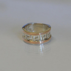 Срібна каблучка з напайками із золота