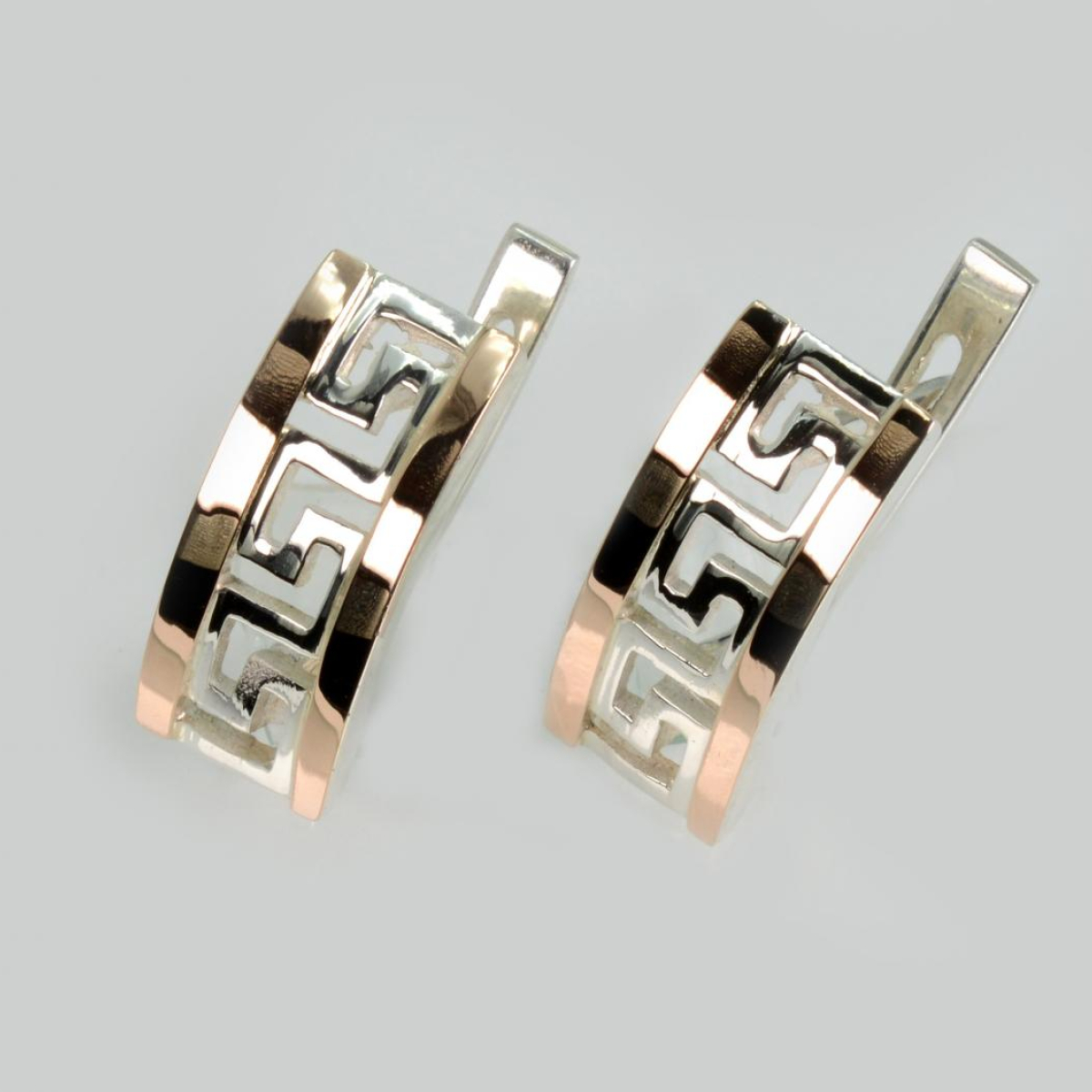 Срібні сережки з золотими вставками