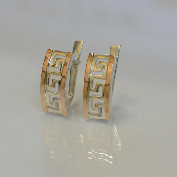 Срібні сережки з золотими вставками