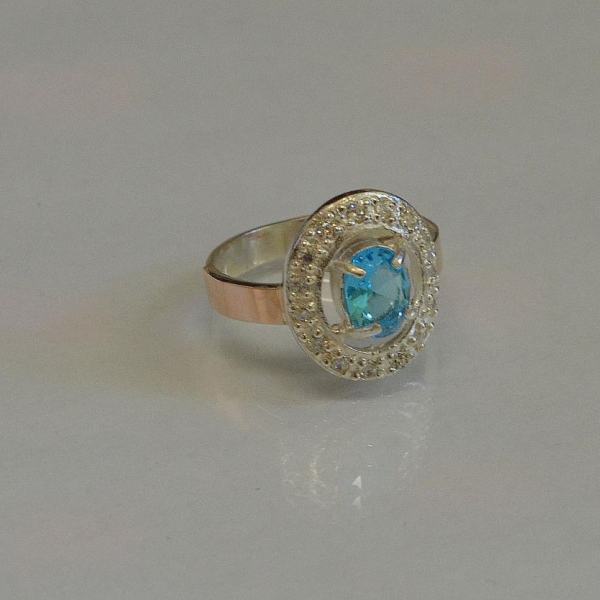 Срібна каблучка з золотими пластинами