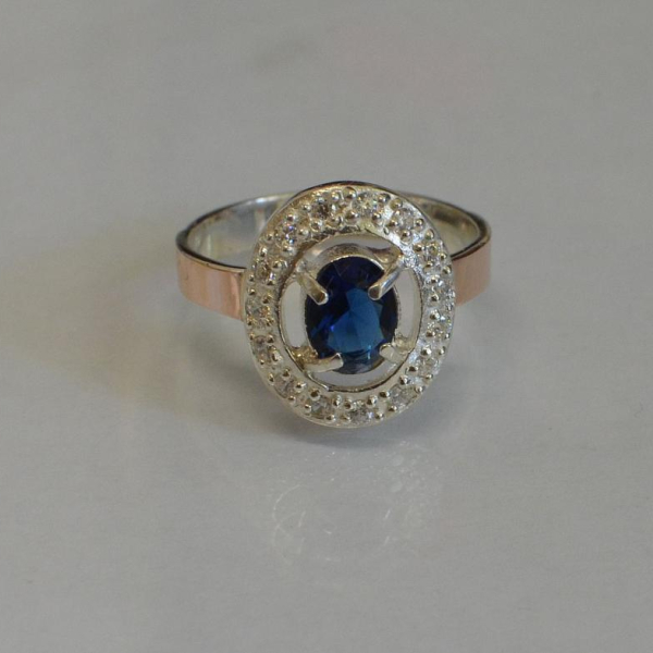 Срібна каблучка з золотими пластинами