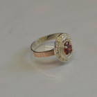 Срібна каблучка з золотими пластинами