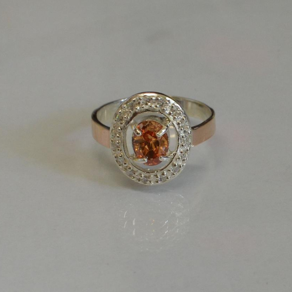 Срібна каблучка з золотими пластинами