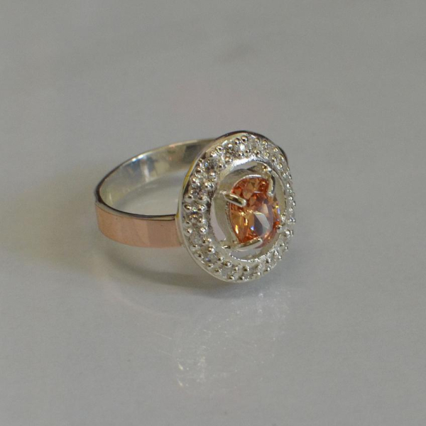 Срібна каблучка з золотими пластинами