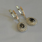 Срібні сережки з накладками з золота