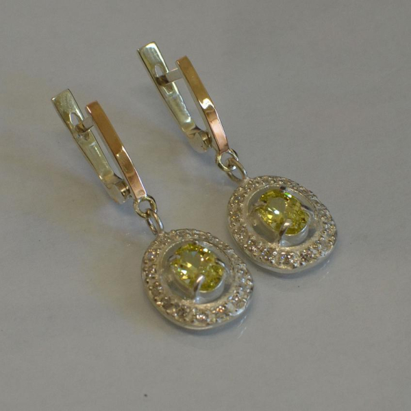 Срібні сережки з накладками з золота