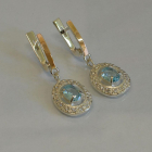 Срібні сережки з накладками з золота